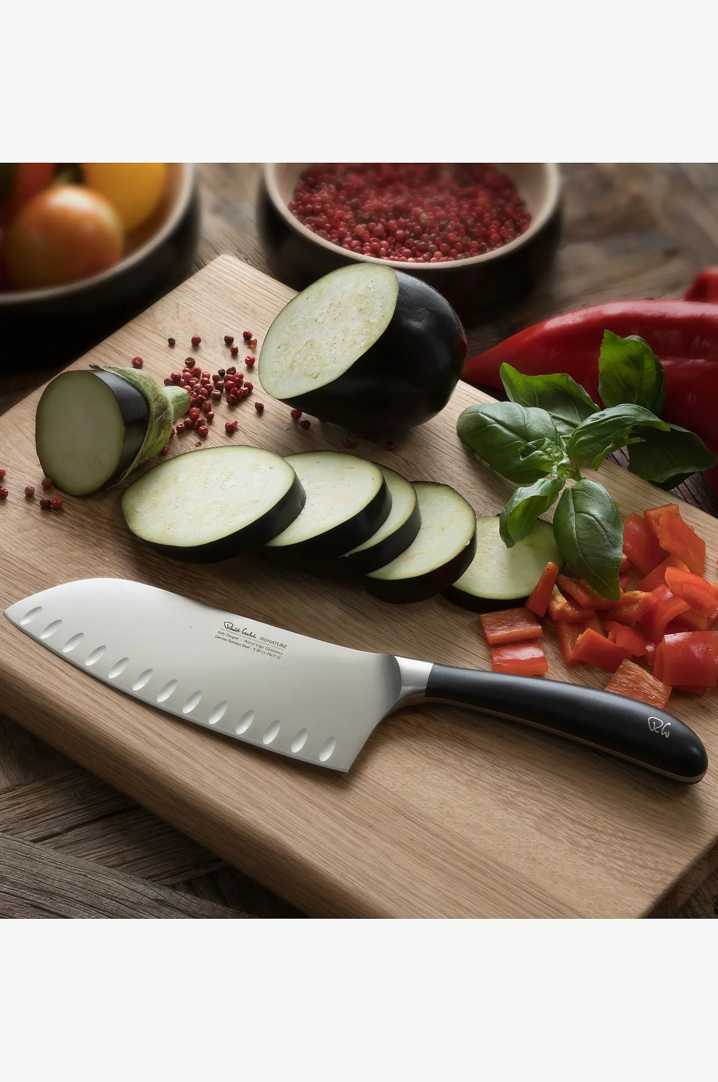 Syvä Santoku-veitsi Signature 17cm/ 7